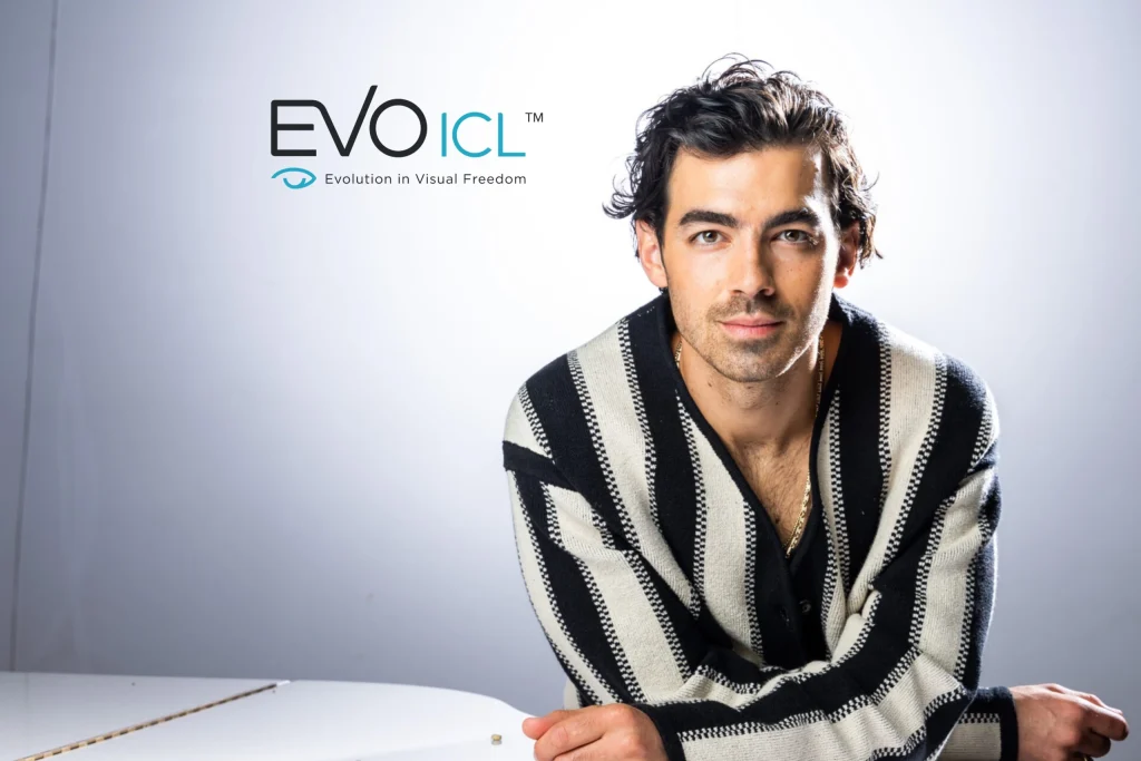 joe jonas loooking into the camera after receiving evo icl